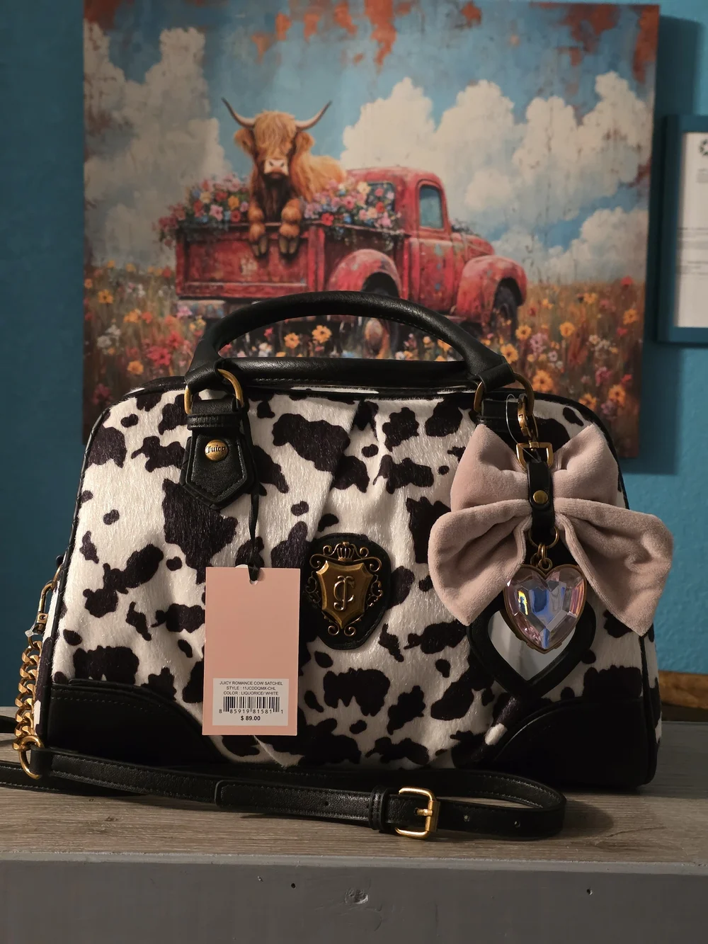 Juicy Couture Black & White Cow Print Satchel with Pink Bow Charm
